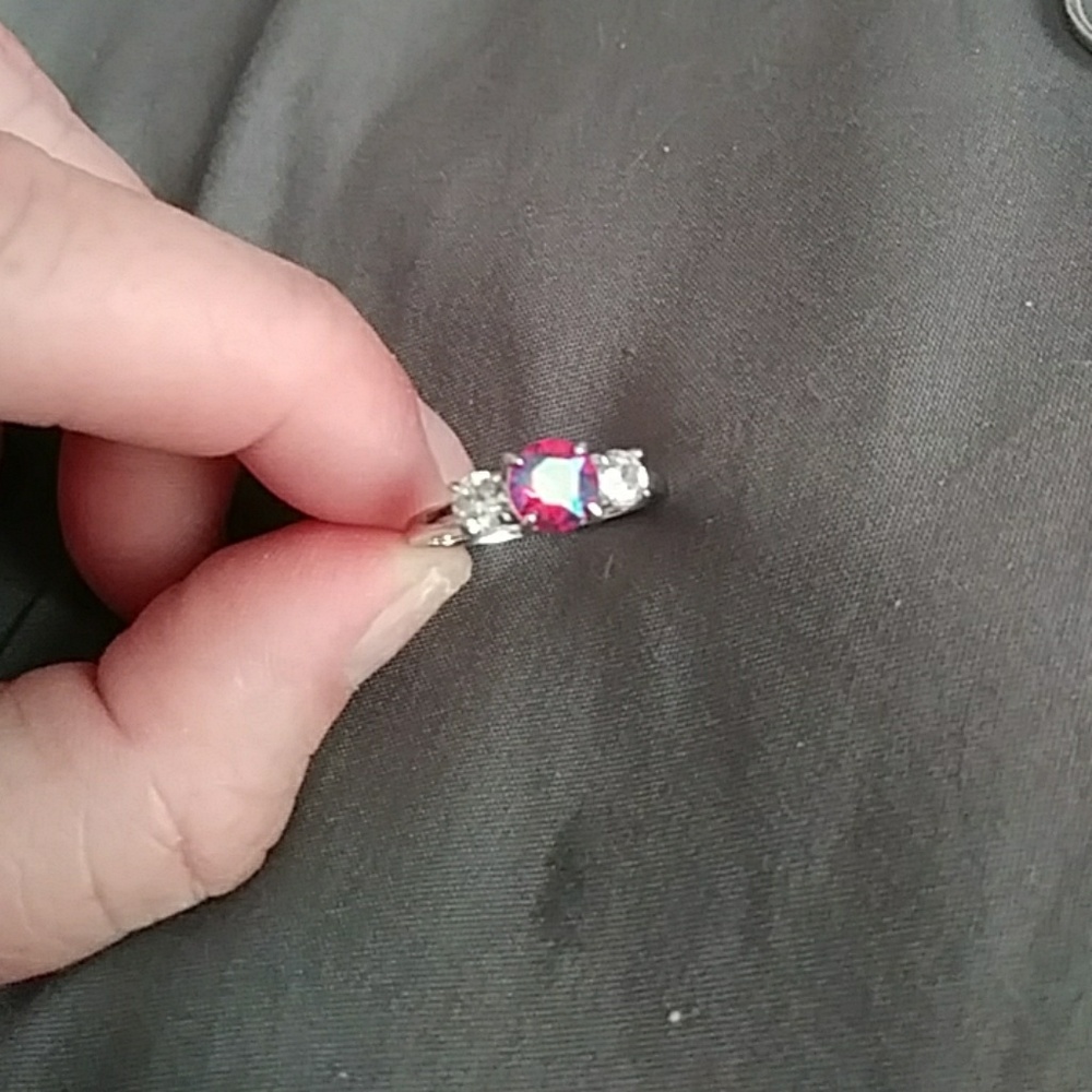 Silver ring with unique colored stone